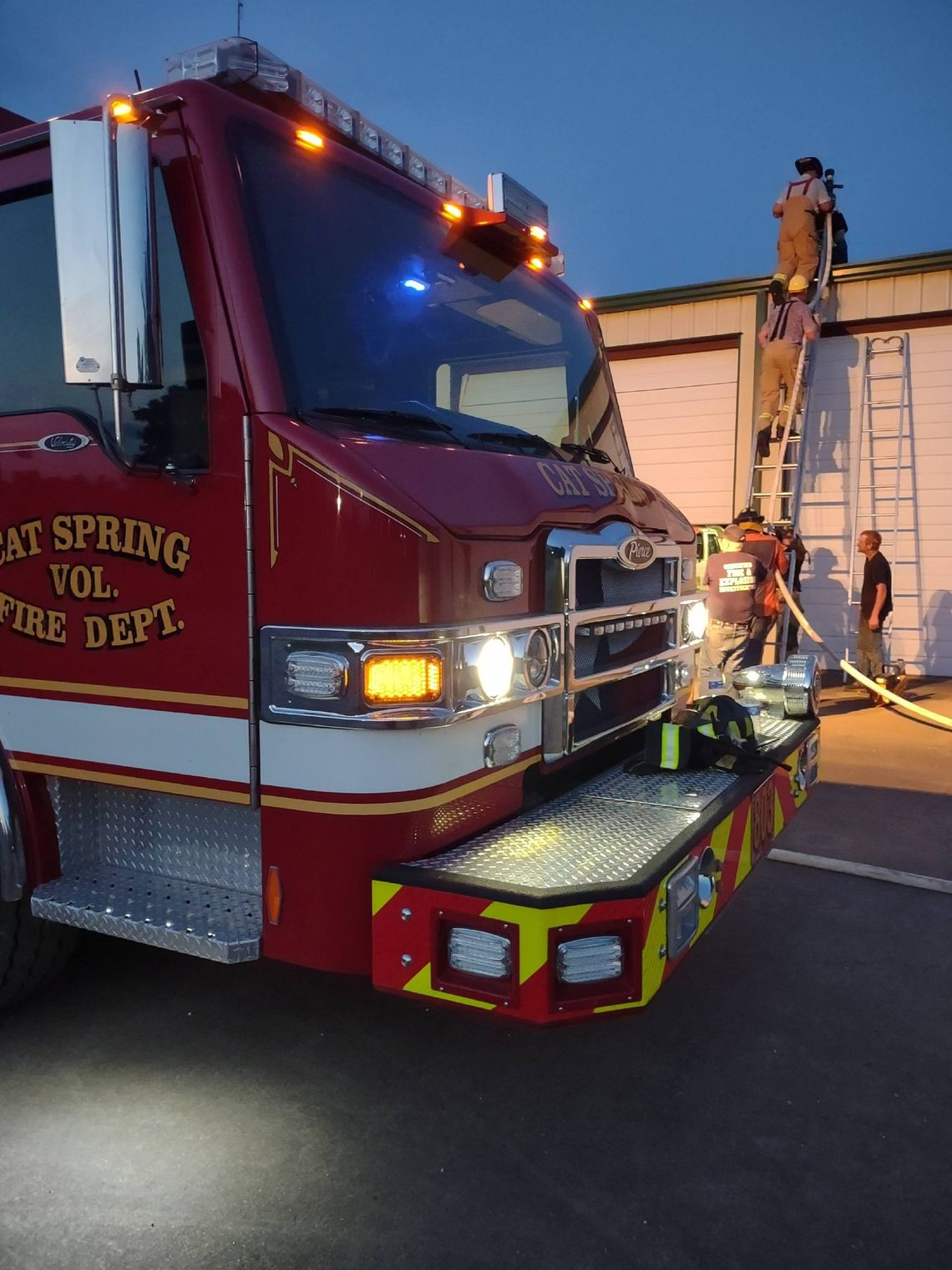 Volunteer Firefighters - Neighbors on the Fire Trucks
