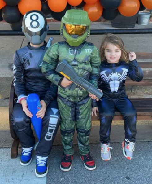 LOCAL FAMILIES LOVED POSING IN THEIR COSTUMES AT THE SEALY NEWS’ PHOTO BOOTH TO CREATE LASTING MEMORIES AT LAST YEAR’S ANNUAL BOO BASH. PHOTO COURTESY OF THE SEALY NEWS